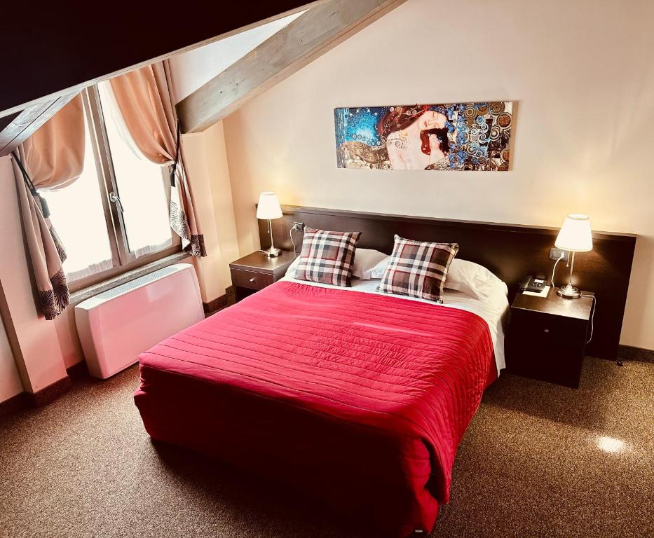 Postel nebo postele na pokoji v ubytování Hotel Malpensa INN Aereoporto
