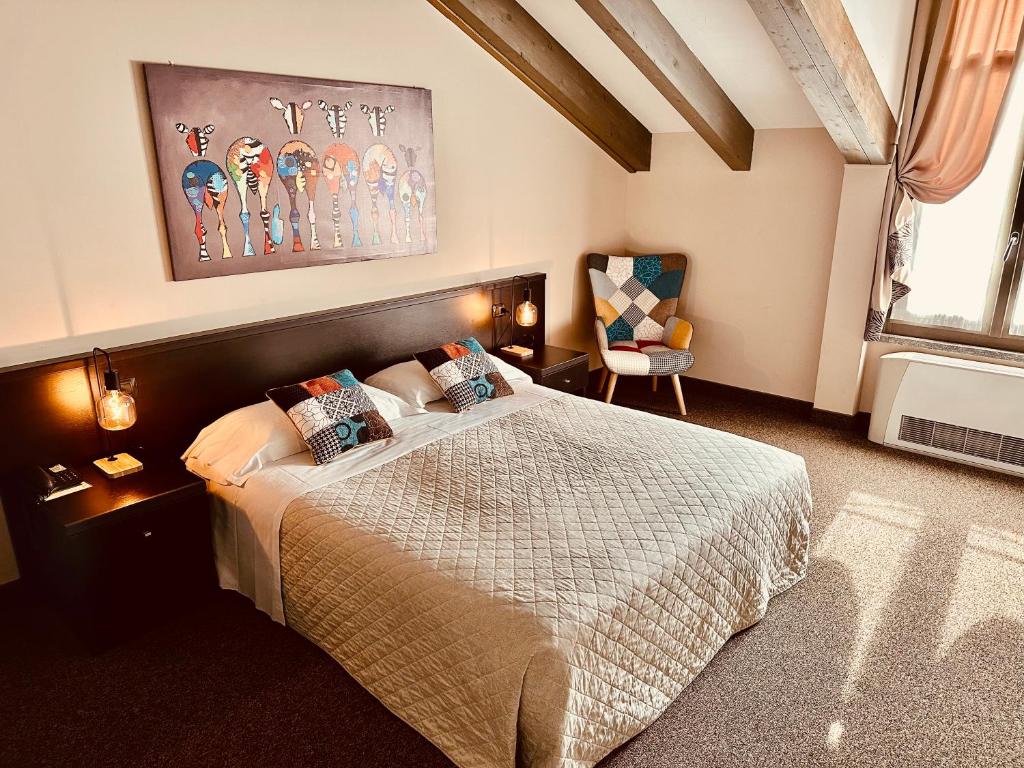 Postel nebo postele na pokoji v ubytování Hotel Malpensa INN Aereoporto
