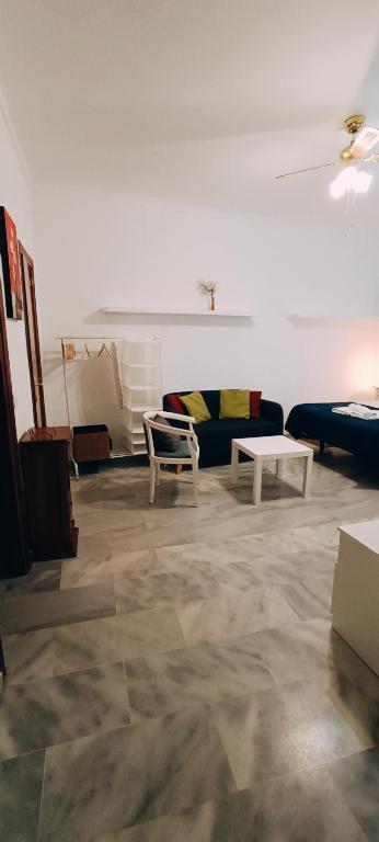 Posedenie v ubytovaní Estudios Santos
