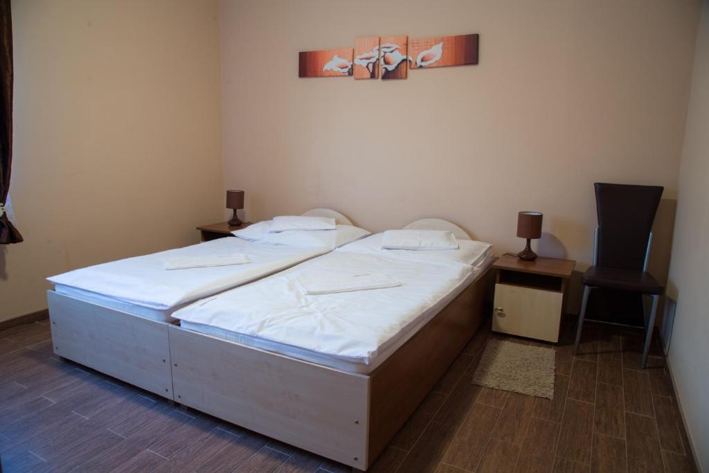 Postel nebo postele na pokoji v ubytování Felsőréti Vendégház