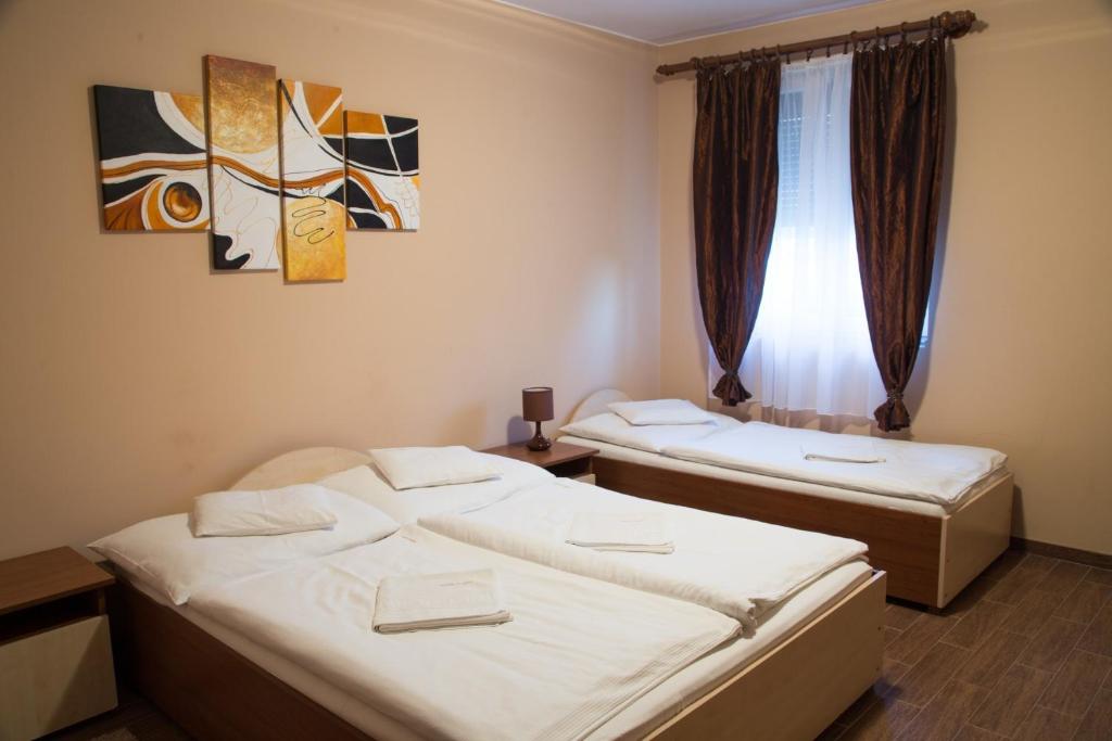 Postel nebo postele na pokoji v ubytování Felsőréti Vendégház