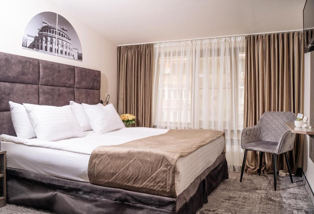 Postel nebo postele na pokoji v ubytování Median Hotel, City Center Yerevan