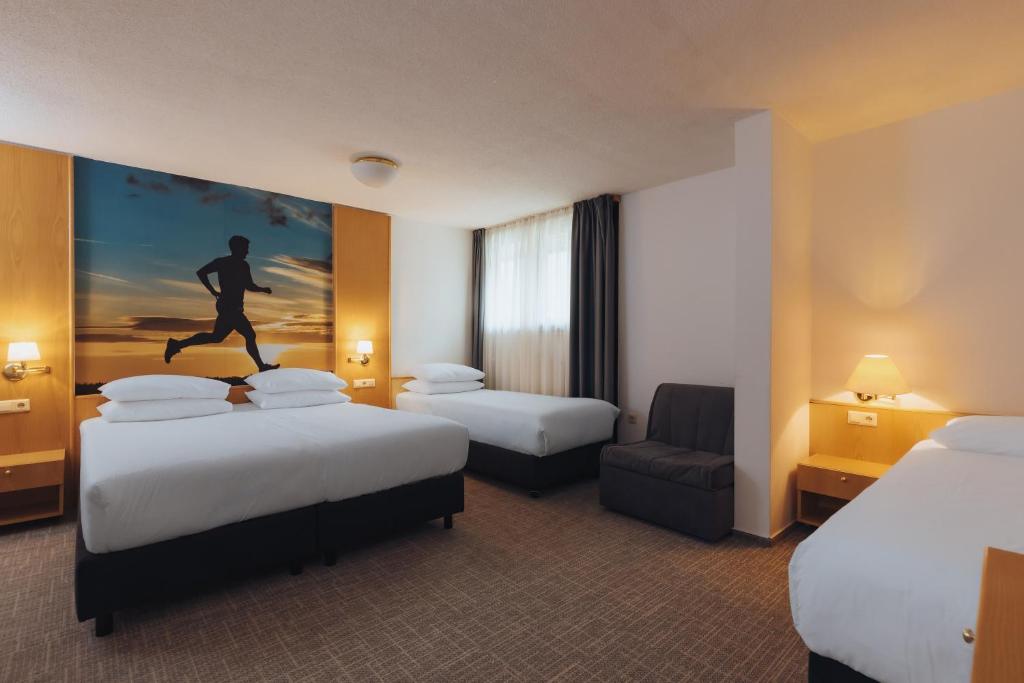 Postel nebo postele na pokoji v ubytování Hotel Kompas