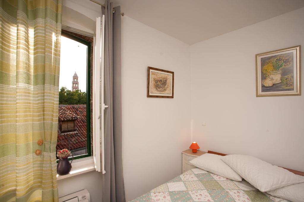 En eller flere senger på et rom på Rooms Split Pezelj