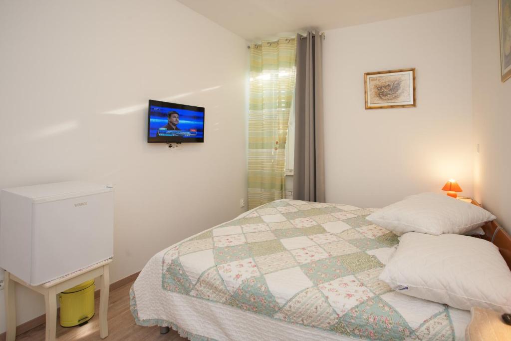En eller flere senger på et rom på Rooms Split Pezelj