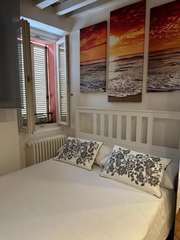 Ένα ή περισσότερα κρεβάτια σε δωμάτιο στο casa corso corsi 1 piano