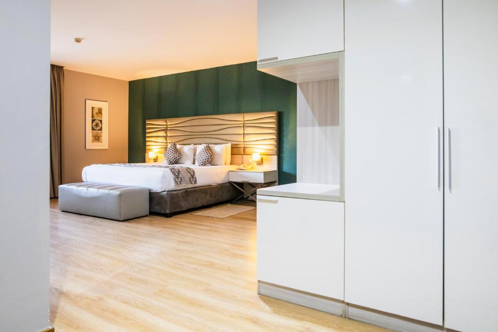 Postel nebo postele na pokoji v ubytování Hotel Maputo lda