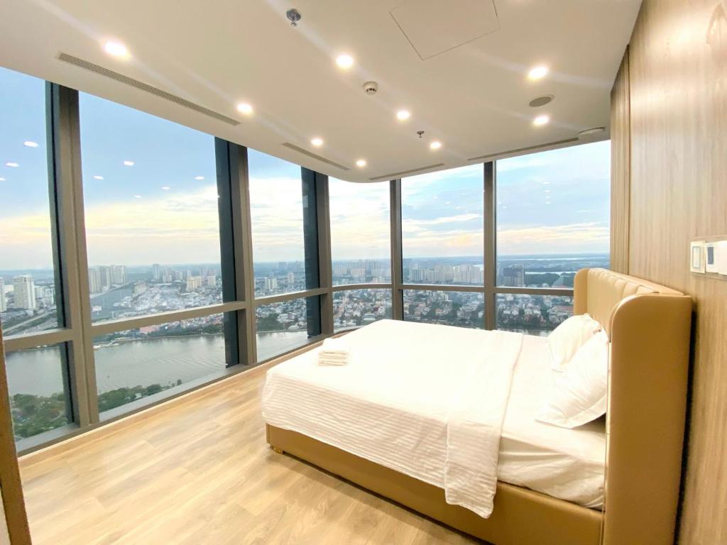 Giường trong phòng chung tại Landmark 81 - AirBnb