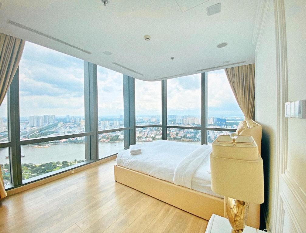 Giường trong phòng chung tại Landmark 81 - AirBnb