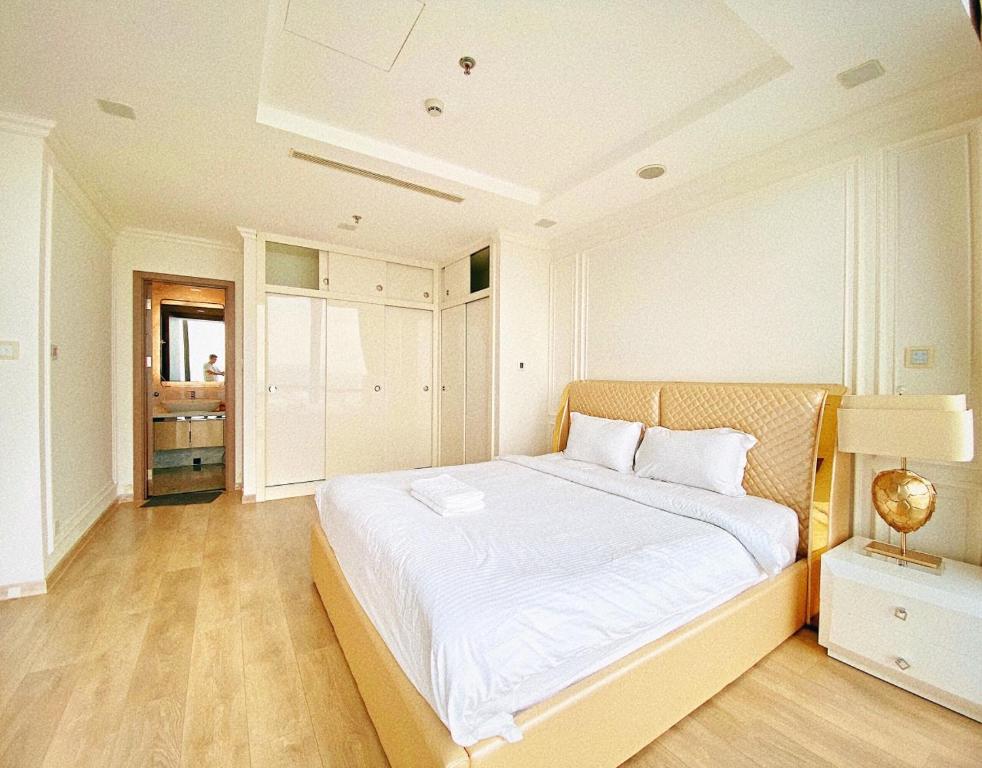 Giường trong phòng chung tại Landmark 81 - AirBnb