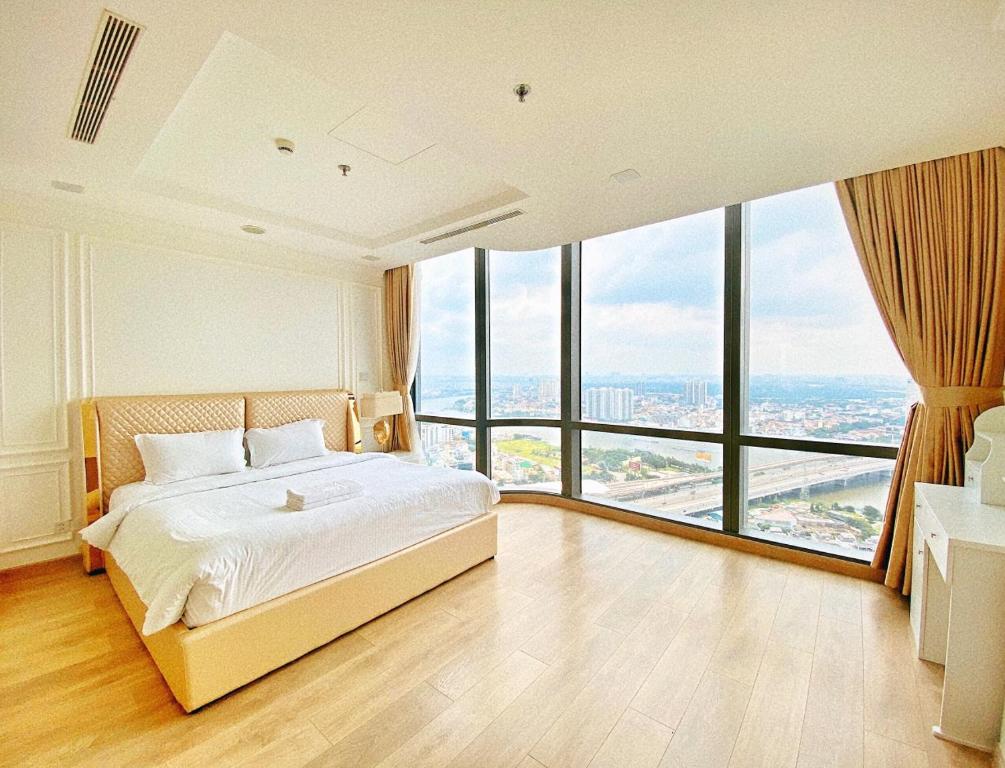 Giường trong phòng chung tại Landmark 81 - AirBnb