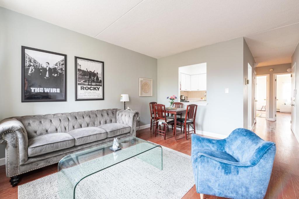 a living room with a couch and a table at Stunning 2 BR in Manhattan in New York