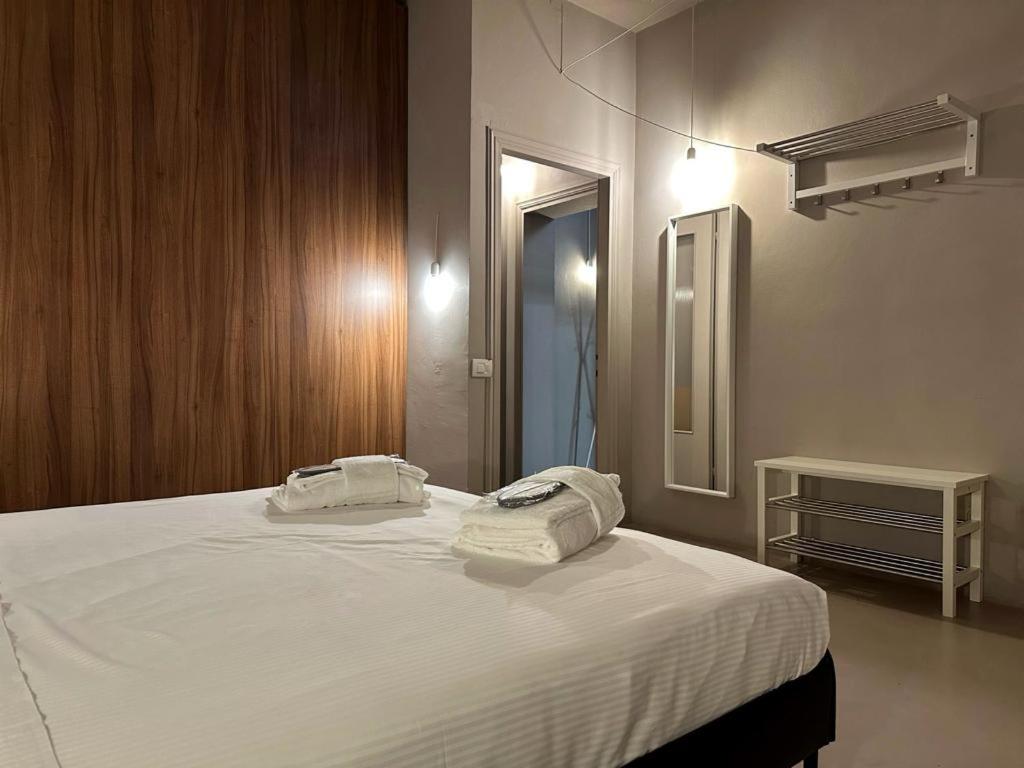 Posteľ alebo postele v izbe v ubytovaní Welc-ōm Santa Giustina apartment