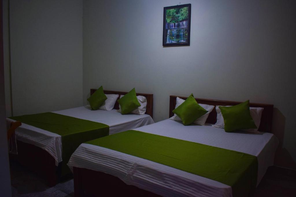 Postel nebo postele na pokoji v ubytování Samara Guest inn