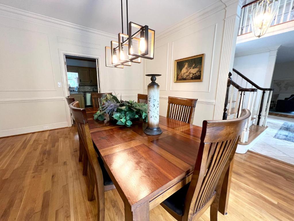 a dining room with a wooden table and chairs at 2811 Hawthorne Dr, NE in Atlanta