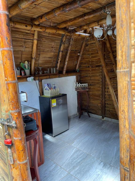 Kuchyň nebo kuchyňský kout v ubytování Cabañas Camino al Agua - Cocorná