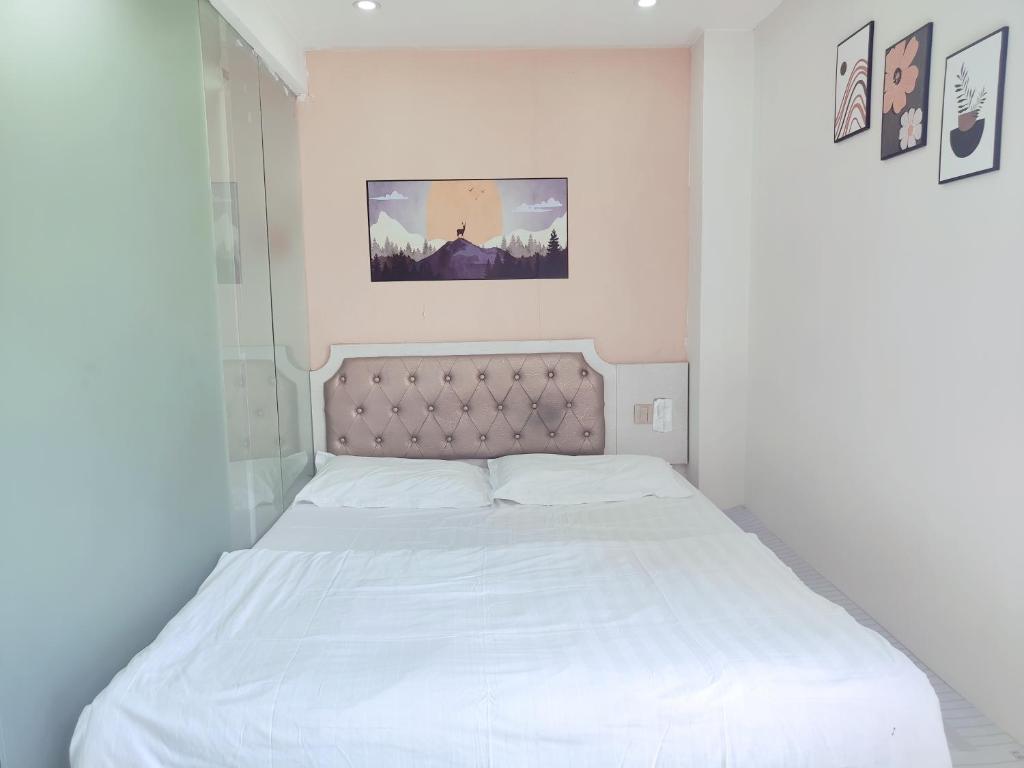 Postel nebo postele na pokoji v ubytování Onederz Hostel Hangzhou