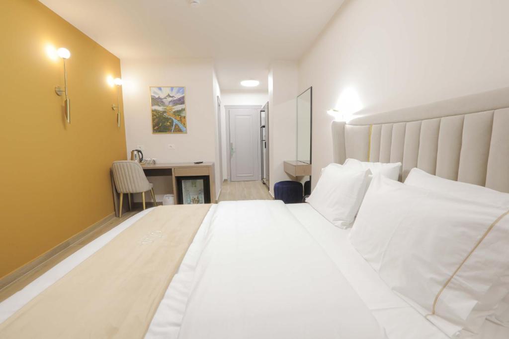 Postel nebo postele na pokoji v ubytování Olia Residence