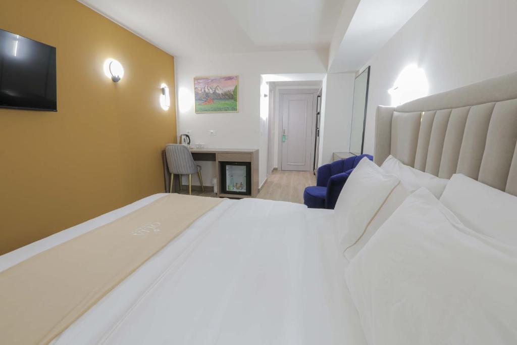 Postel nebo postele na pokoji v ubytování Olia Residence