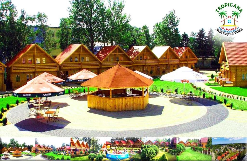 a large building with a pavilion in front of it at Tropicana Ϫϫ Holiday Houses in Jastrzębia Góra