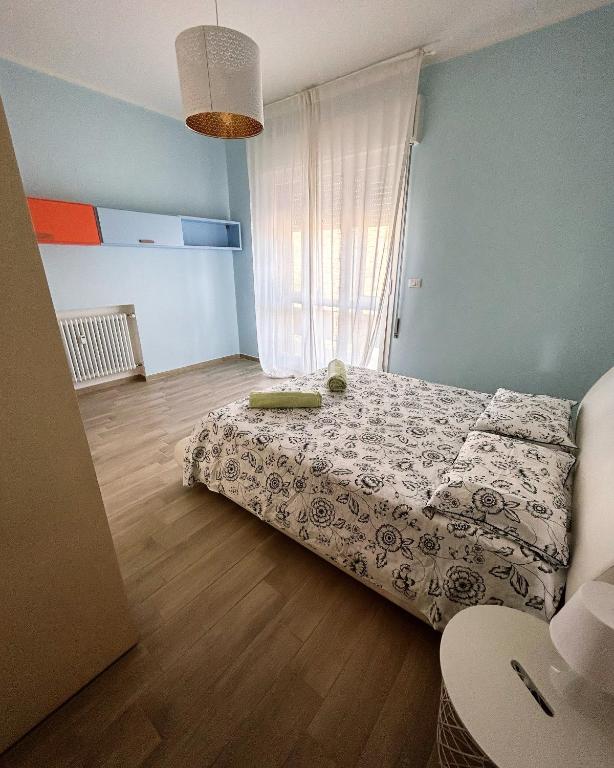 Łóżko lub łóżka w pokoju w obiekcie Casa di Ily
