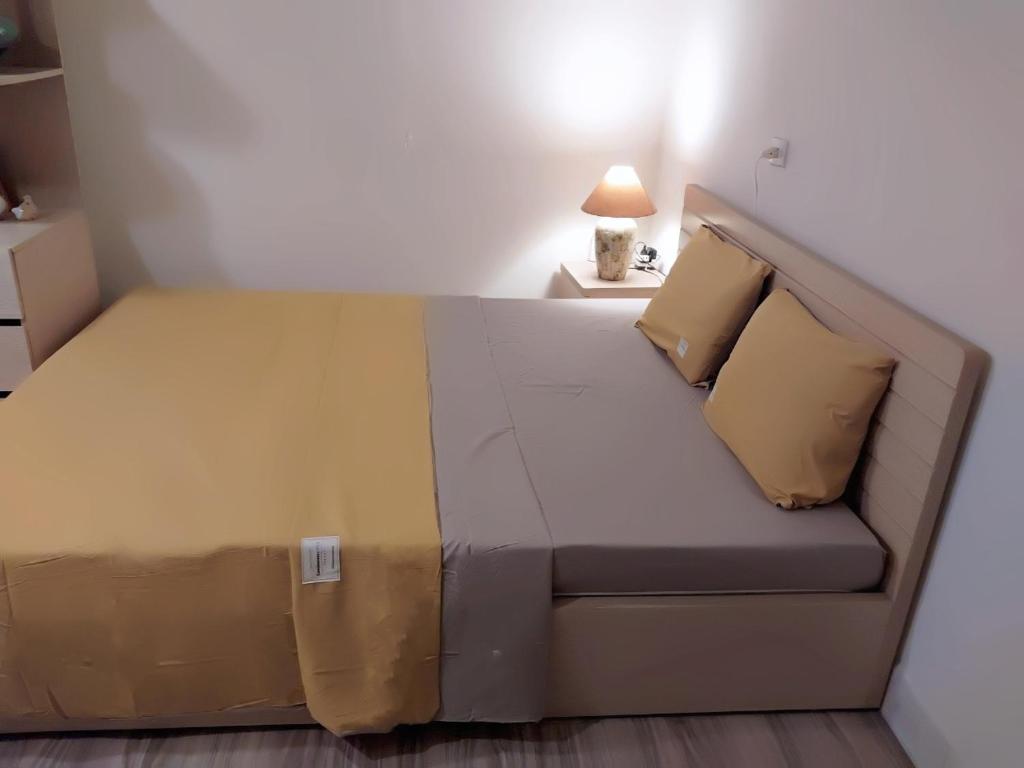Postel nebo postele na pokoji v ubytování Da Tree Homestay