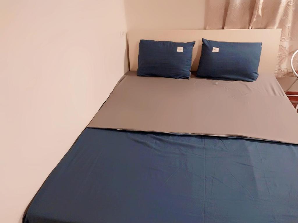 Postel nebo postele na pokoji v ubytování Da Tree Homestay