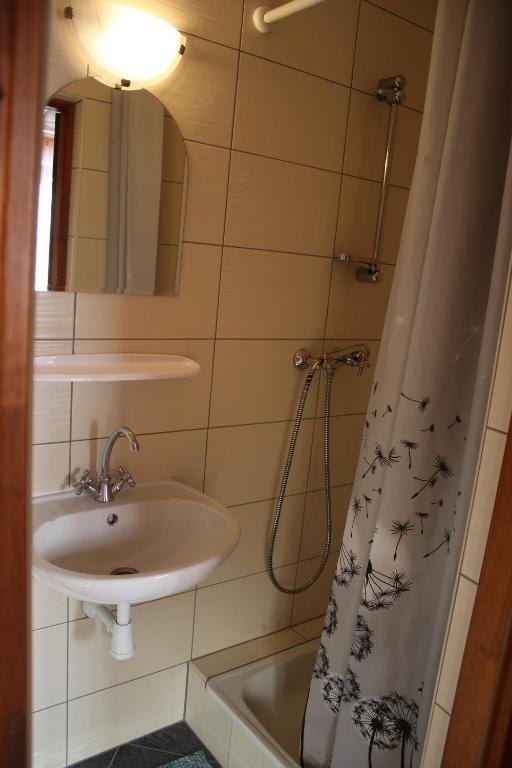Kúpeľňa v ubytovaní Pokoje Gościnne Łukaszczyk