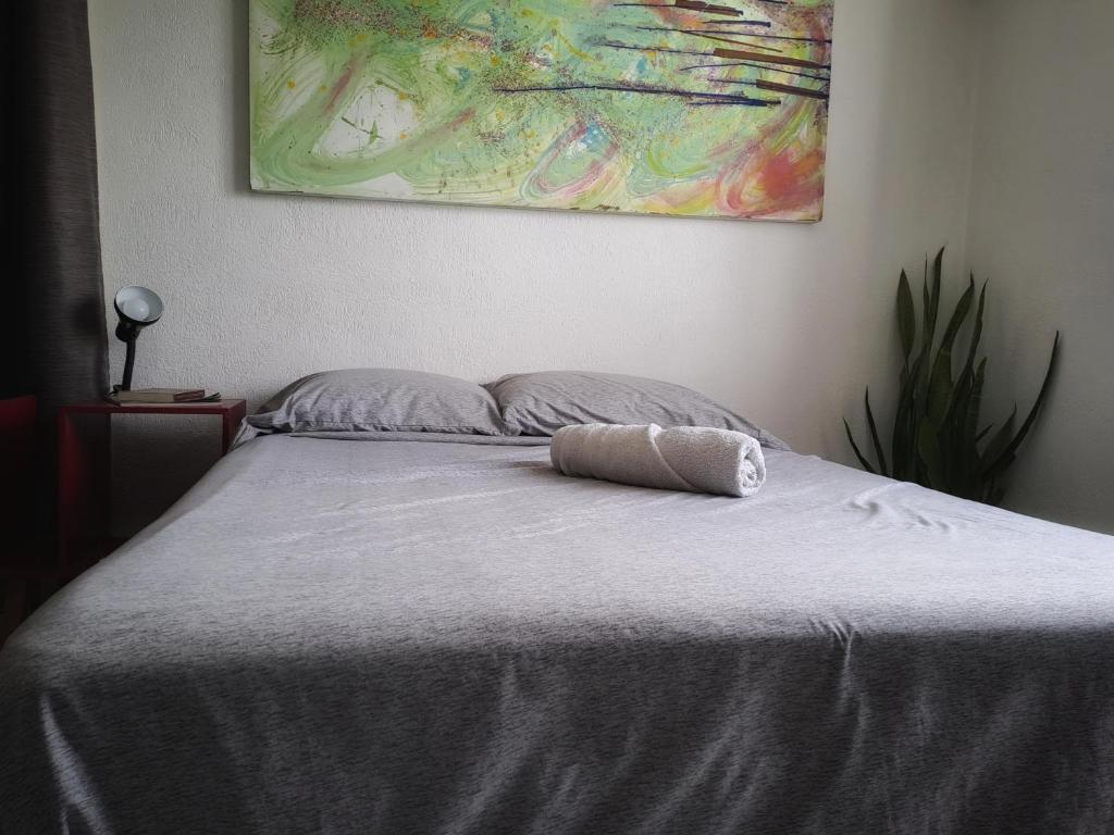 Postel nebo postele na pokoji v ubytování Tu Casa en el Caribe