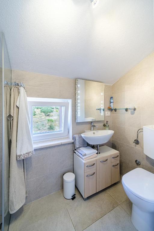 Koupelna v ubytování Holiday Home Kuća Sunca
