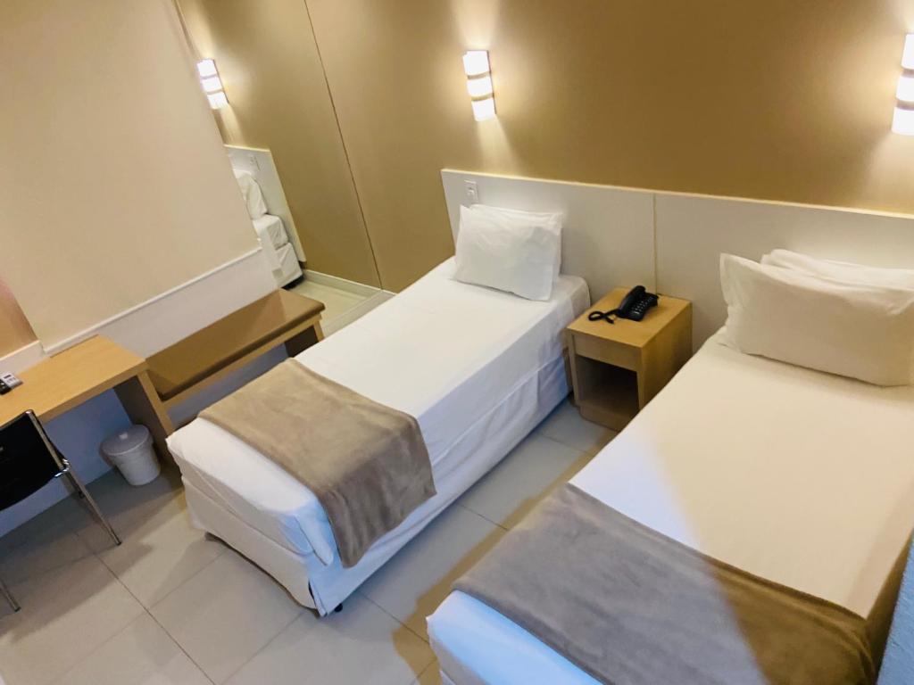 Postel nebo postele na pokoji v ubytování Hotel Thomasi Express