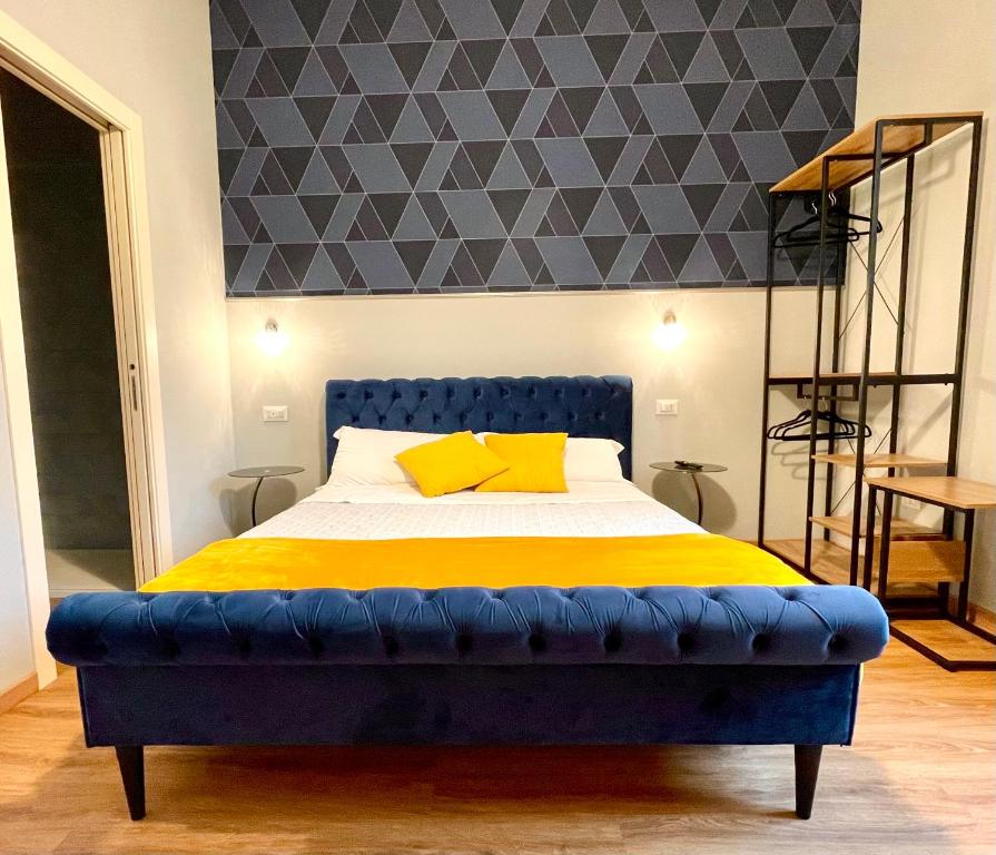 Postel nebo postele na pokoji v ubytování Domus 44 Rooms