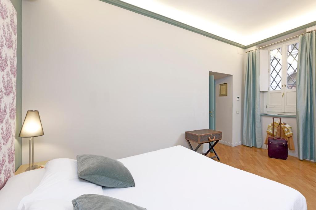 Postel nebo postele na pokoji v ubytování Boutique Hotel Anahi