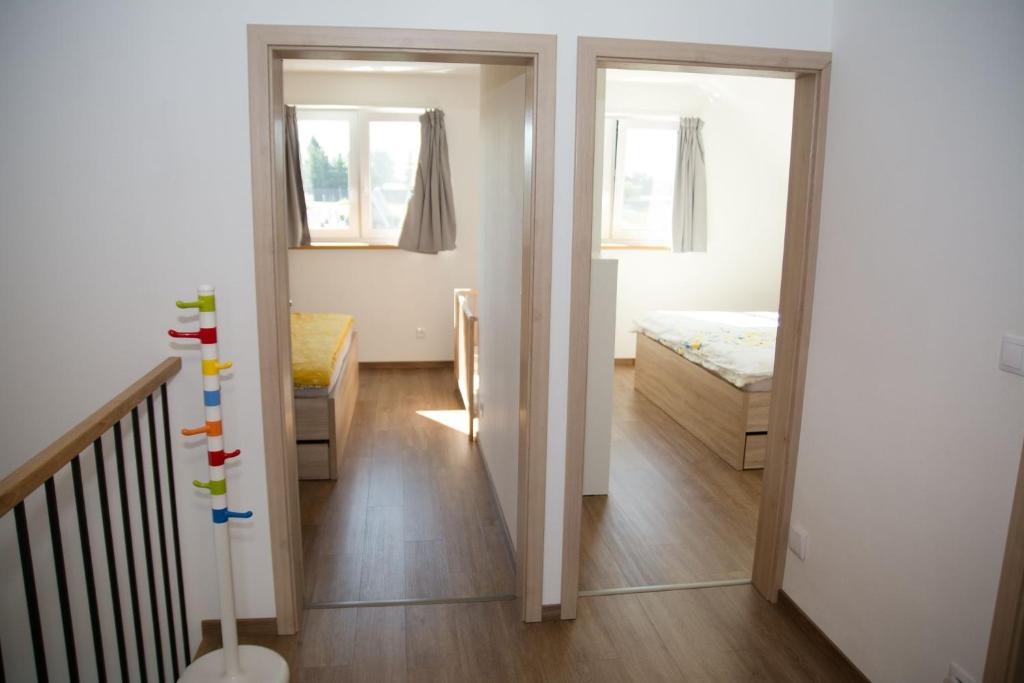 Postel nebo postele na pokoji v ubytování Chata Miki