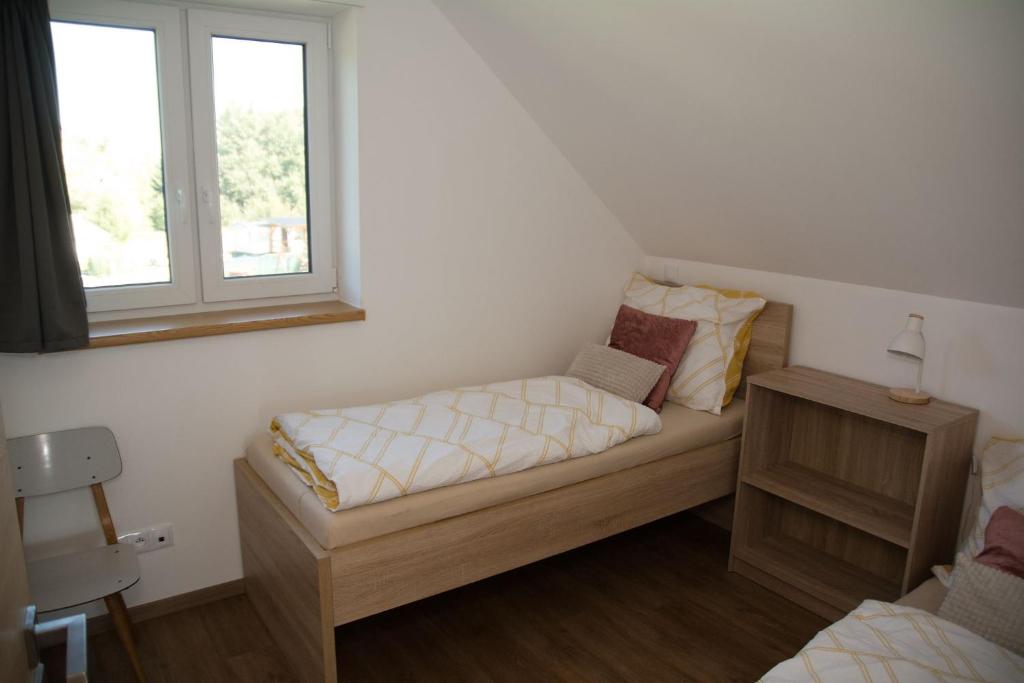 Postel nebo postele na pokoji v ubytování Chata Miki