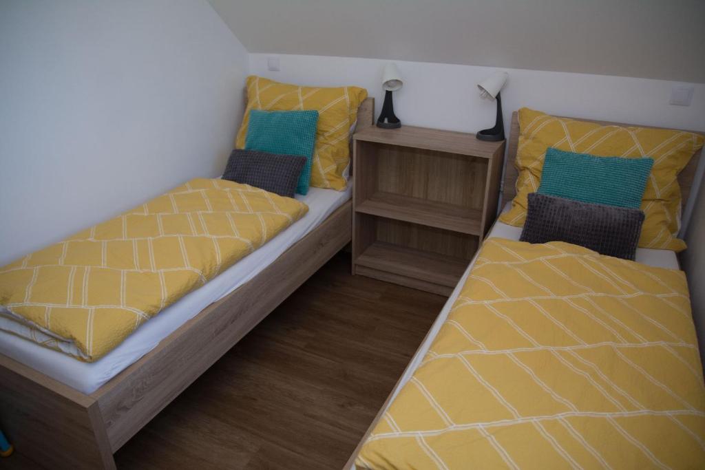 Postel nebo postele na pokoji v ubytování Chata Miki