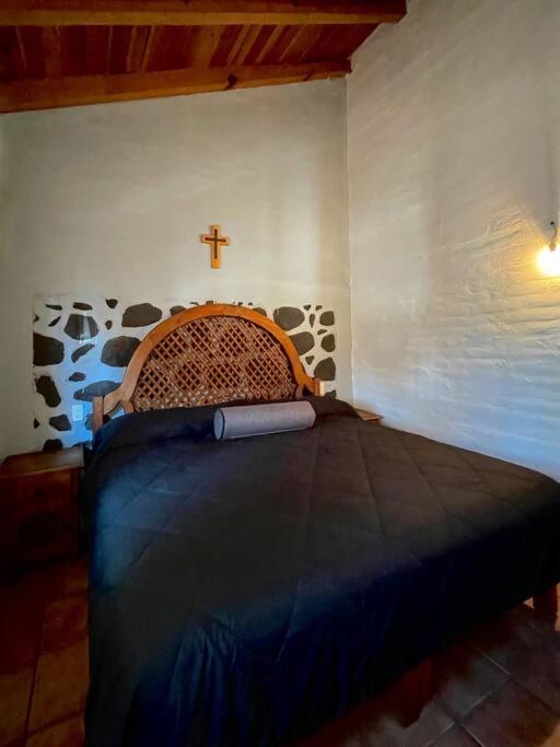 Postel nebo postele na pokoji v ubytování Cabaña Ledesma