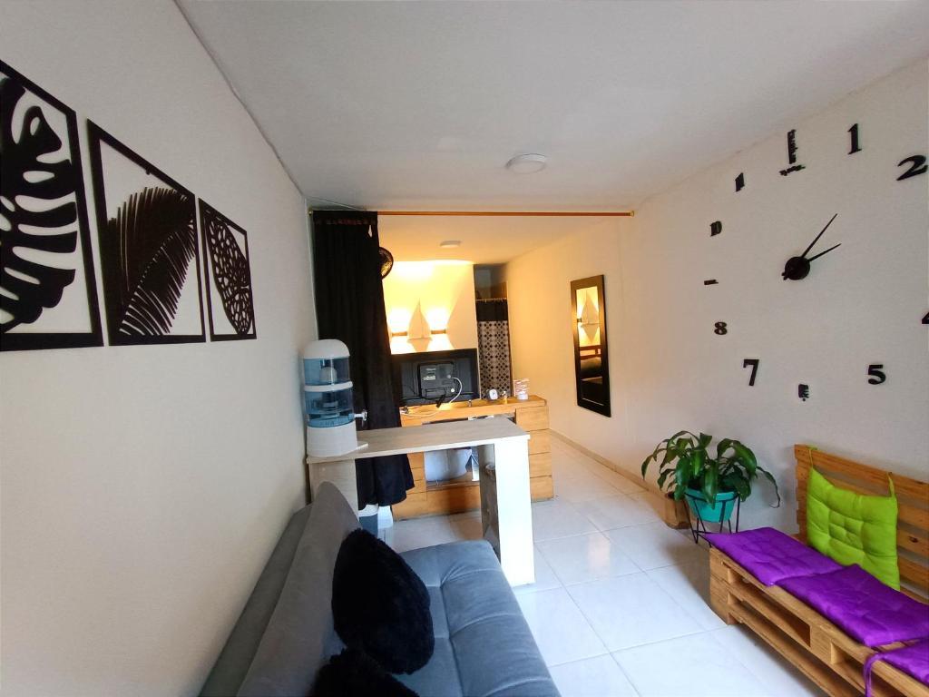 Posezení v ubytování OSIMiRI PLAZA Apartamento Naturaleza y aventura