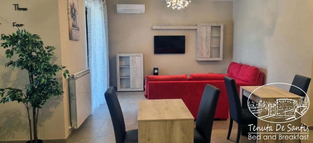 TV a/nebo společenská místnost v ubytování Tenuta De Santis