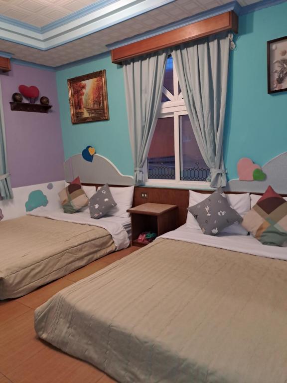 Postel nebo postele na pokoji v ubytování Heart Seed B&B