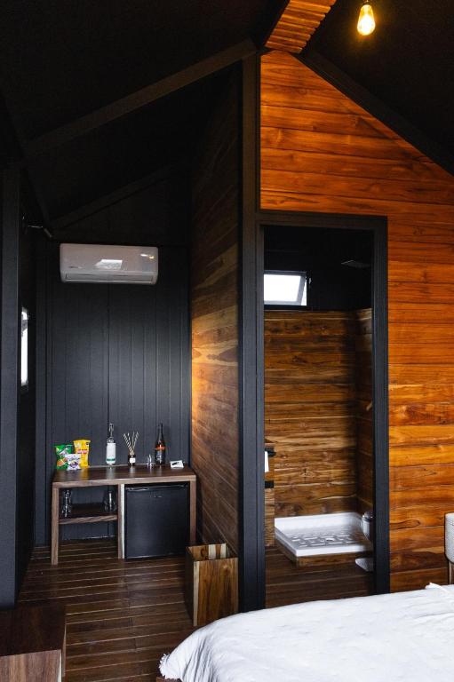 Postel nebo postele na pokoji v ubytování Hotel Coyote