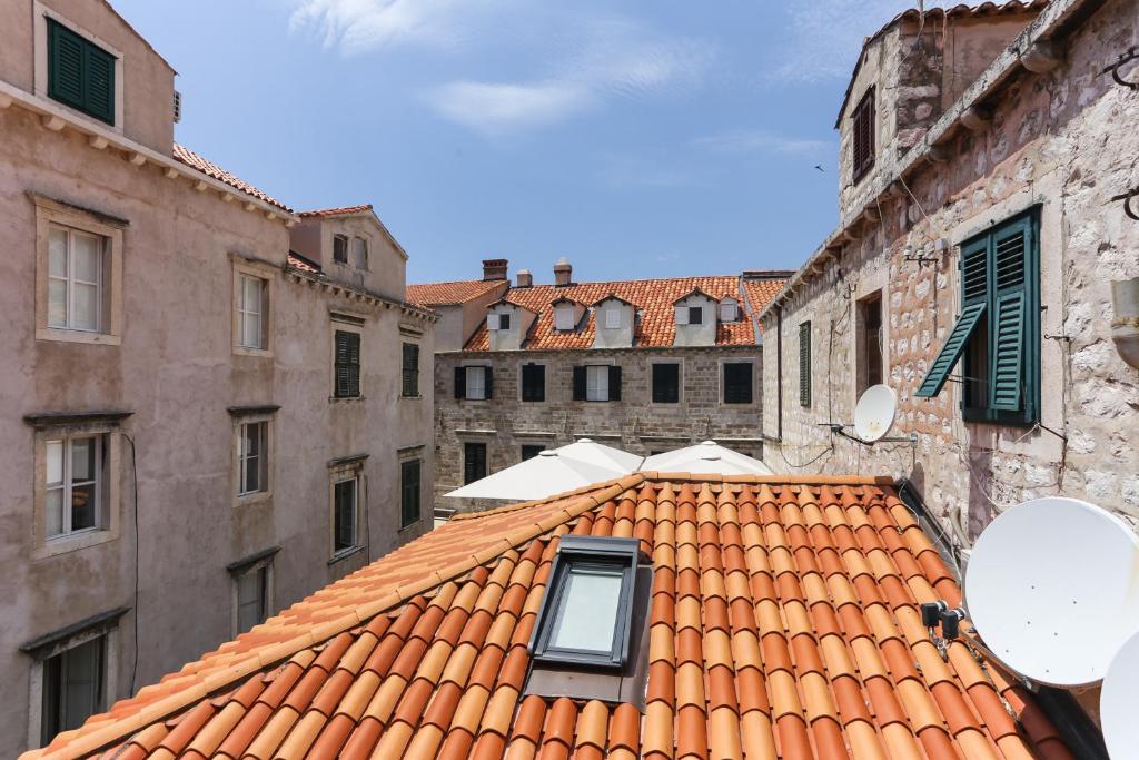 a window on the roof of a building at Apartment Ikana in Dubrovnik