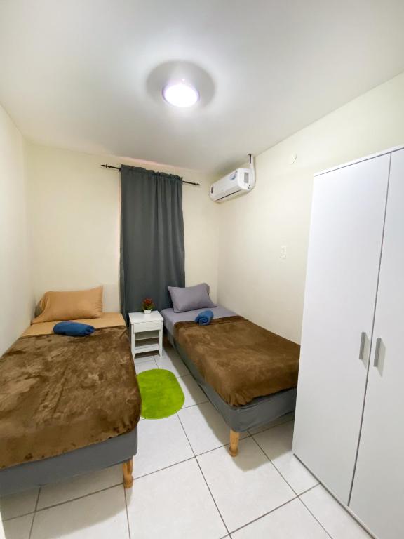 Postel nebo postele na pokoji v ubytování Kas di Ma
