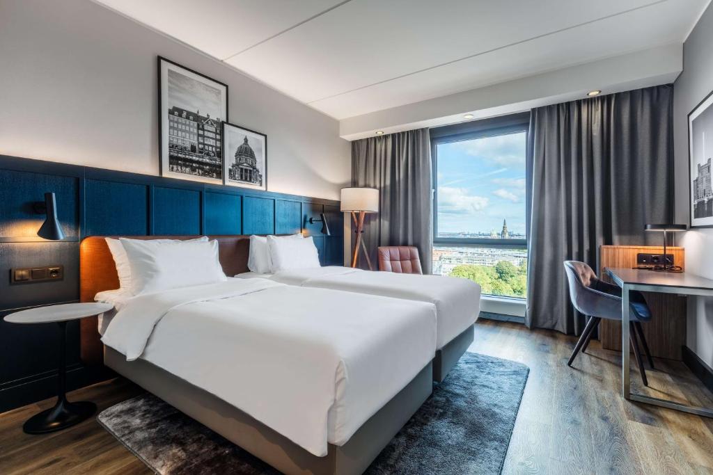 Postel nebo postele na pokoji v ubytování Radisson Blu Scandinavia Hotel, Copenhagen