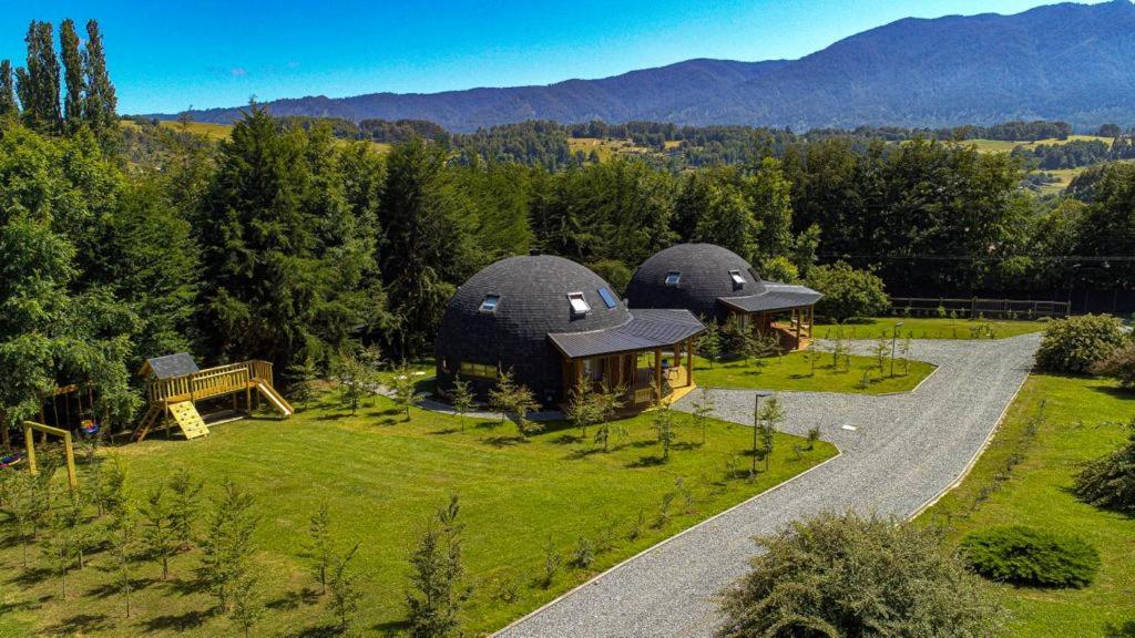 an aerial view of a home with two domes at Domos Futronhue in Futrono