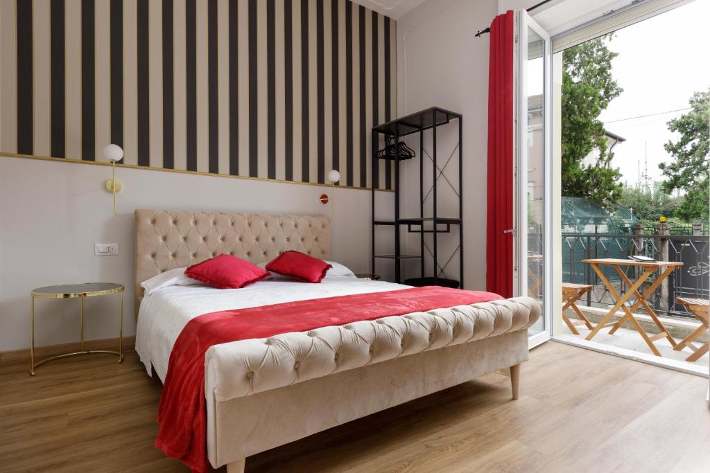 Postel nebo postele na pokoji v ubytování Domus 44 Rooms