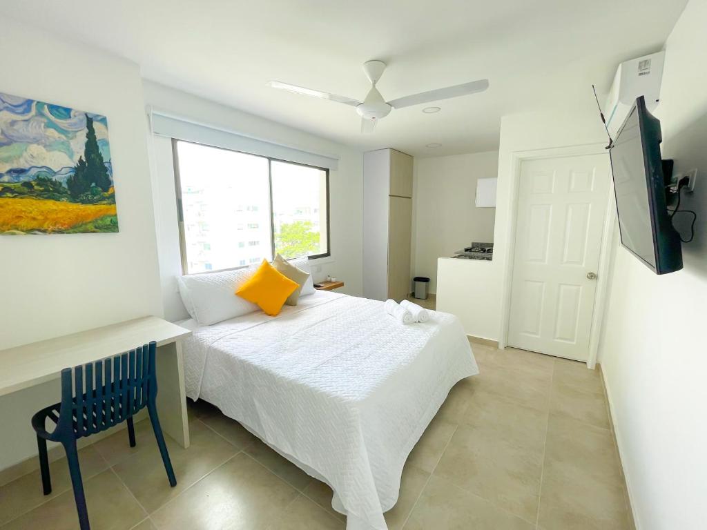 Postel nebo postele na pokoji v ubytování Magico Apartaestudio con Piscina 1 Habitacion PR56A