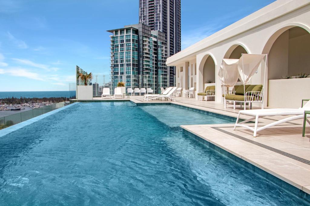 a swimming pool on the roof of a building at Luxury La Isla in Gold Coast