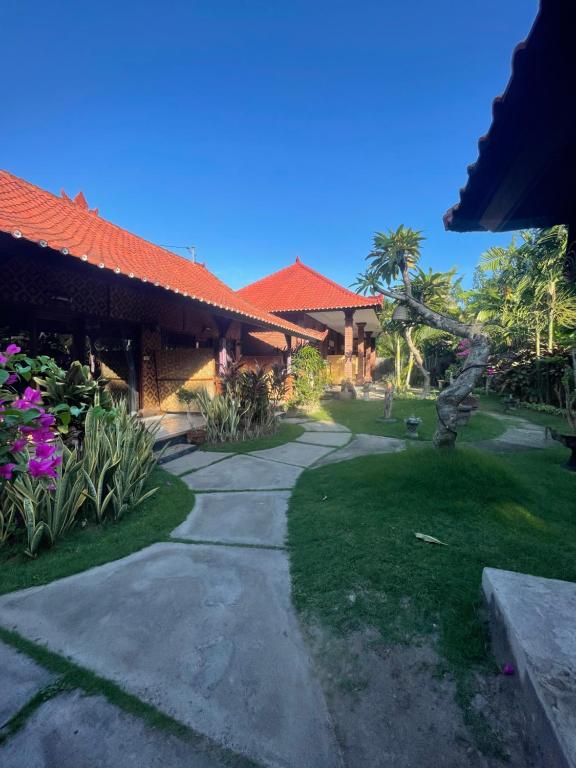 Zahrada ubytování Tebu menjangan homestay