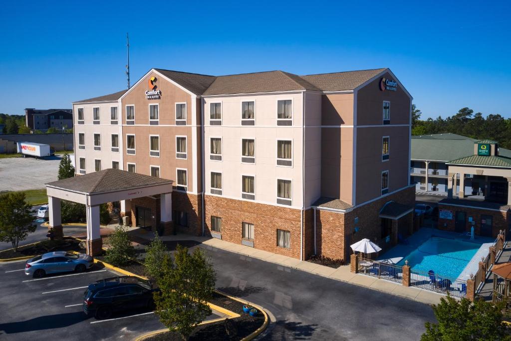 an aerial view of a hotel with a pool at Comfort Inn & Suites Augusta West Near Fort Eisenhower in Augusta